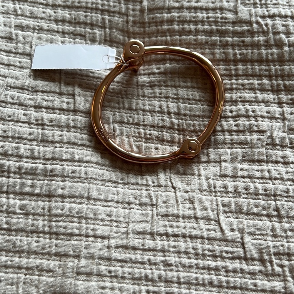 Miansai rose gold colored screw on bracelet